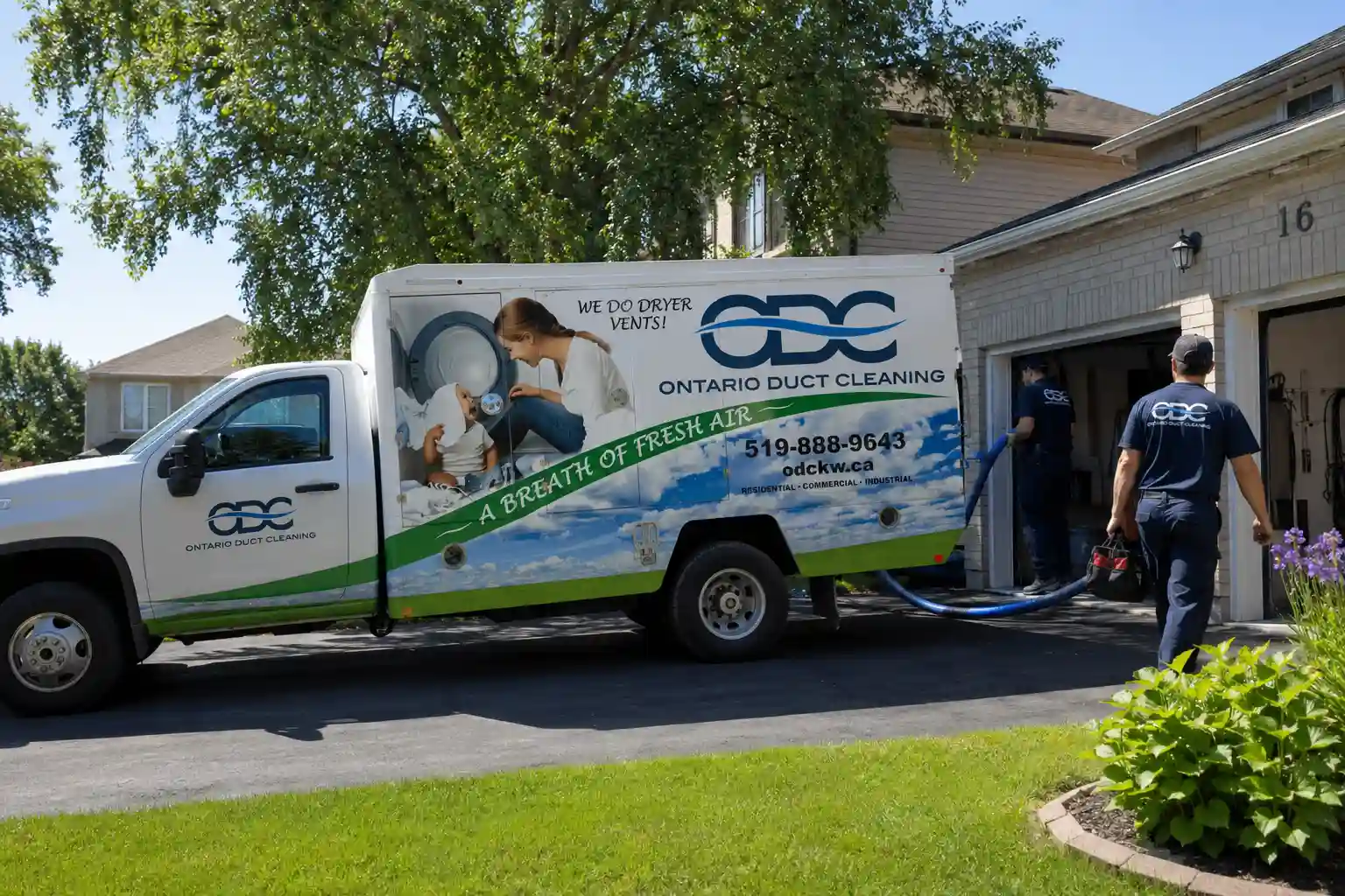 ODC technicians performing residential duct cleaning at a home in Ontario during summer